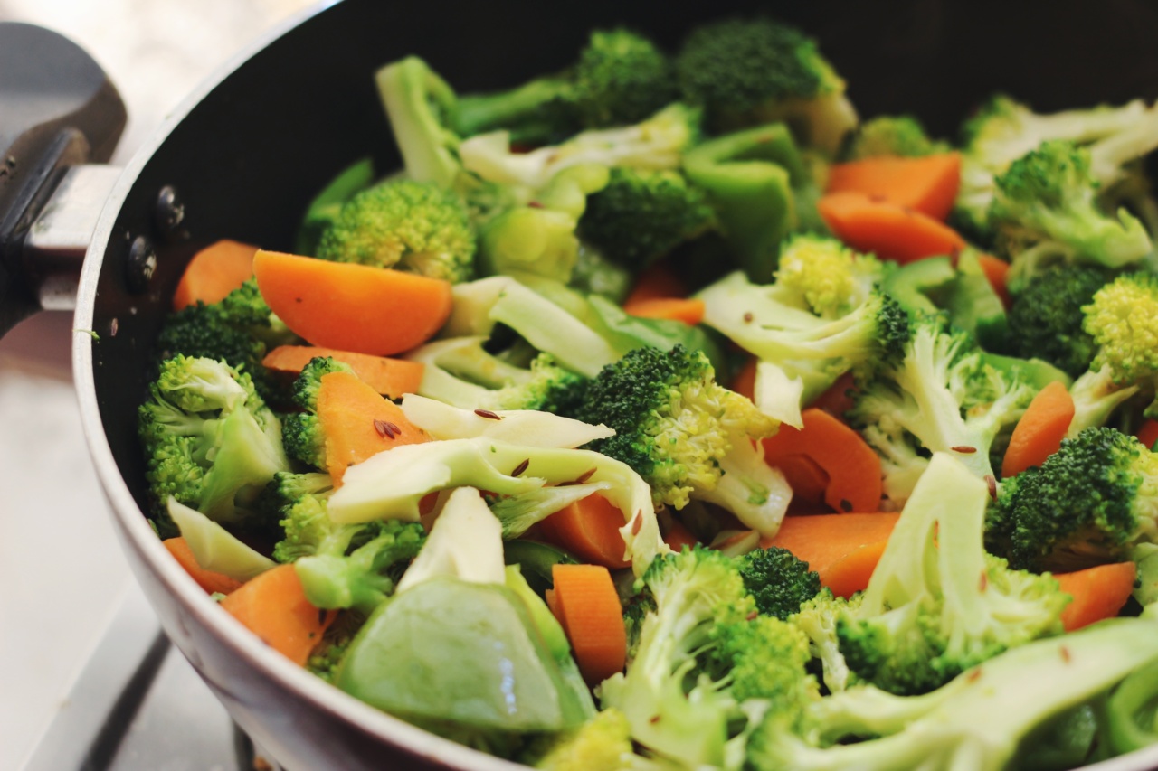 Screws with steamed broccoli and sliced carrots