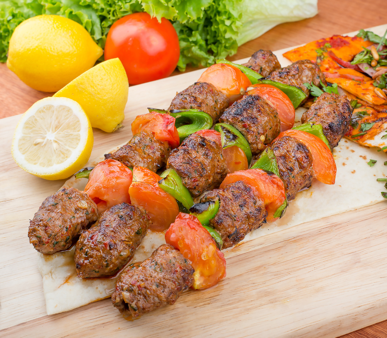 Screws with grilled zucchini and sliced peppers